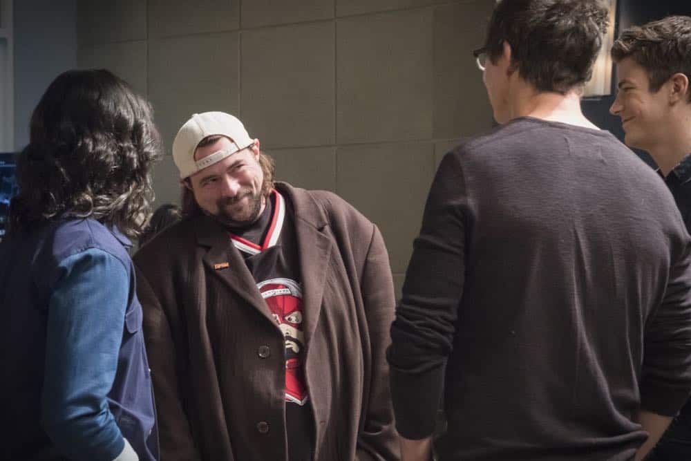 The Flash -- "Null and Annoyed" -- Image Number: FLA417a_BTS_0395.jpg -- Pictured (L-R): Behind the scenes with Kevin Smith, Tom Cavanagh and Grant Gustin -- Photo: Katie Yu/The CW -- é 2018 The CW Network, LLC. All rights reserved