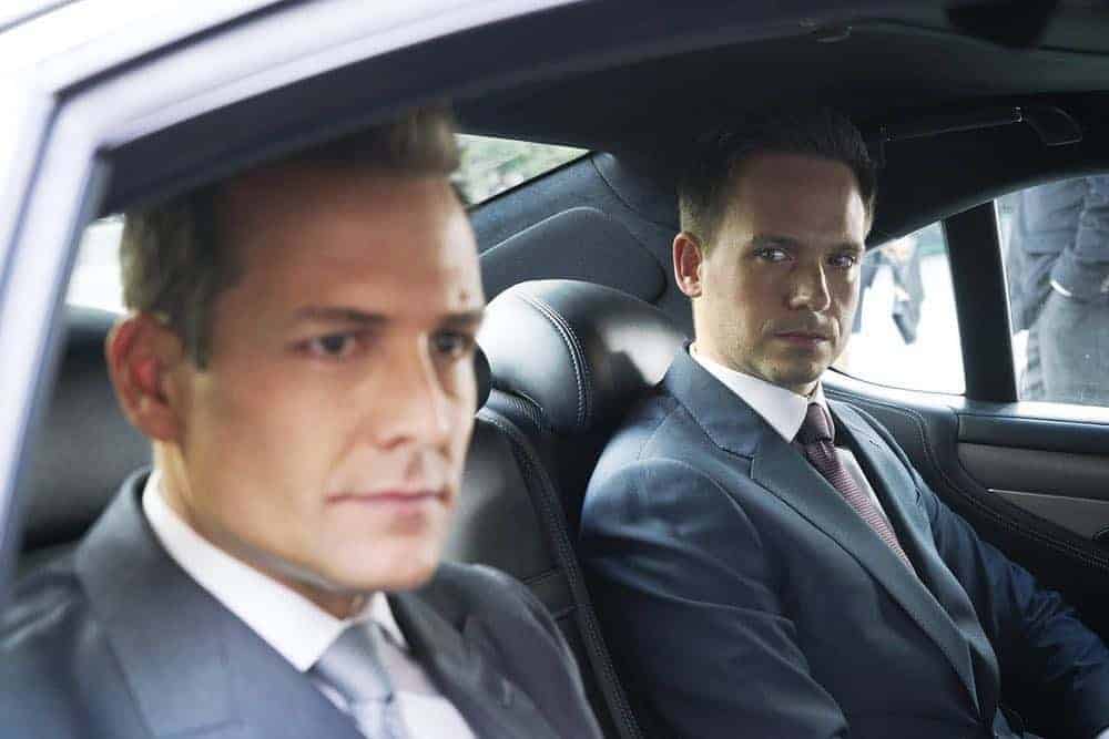 SUITS -- "Inevitable" Episode 713 -- Pictured: (l-r) Gabriel Macht as Harvey Specter, Patrick J. Adams as Mike Ross -- (Photo by: Ian Watson/USA Network)