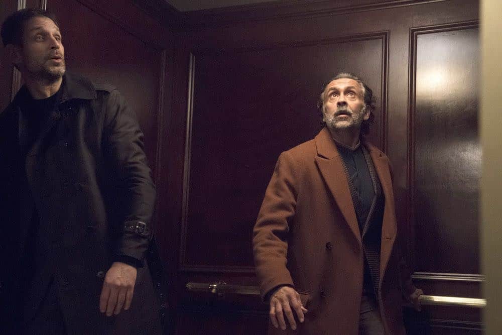 THE BLACKLIST -- "Zarak Mosadek (#23)" Episode 518 -- Pictured: (l-r) Mustafa Gatollari as Guard, Bernard White as Zarak Mosadek -- (Photo by: Virginia Sherwood/NBC)
