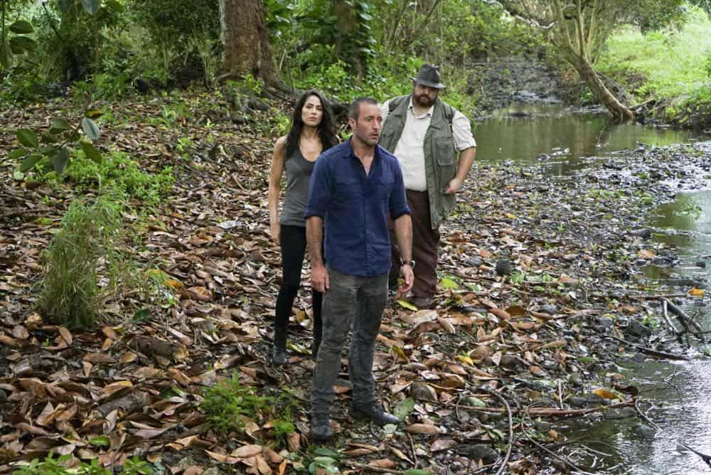 "He lokomaika'i ka manu o Kaiona" -- Catherine Rollins (Michelle Borth) recruits McGarrett and Jerry to help her track down a uranium deposit thought to be hidden on an abandoned Hawaiian island before a suspected terrorist can make dirty bombs with it. Also, when Junior falls and is trapped in a ravine, he reflects on his estranged relationship with his father, on HAWAII FIVE-0, Friday, April 13 (9:00-10:00 PM, ET/PT) on the CBS Television Network. Pictured left to right: Michelle Borth as Catherine Rollins, Alex O'Loughlin as Steve MCGarrett and Jorge Garcia as Jerry Ortega. Photo: Karen Neal/CBS é2018 CBS Broadcasting, Inc. All Rights Reserved ("He lokomaika'i ka manu o Kaiona" is Hawaiian for "Kind is the Bird of Kaiona")