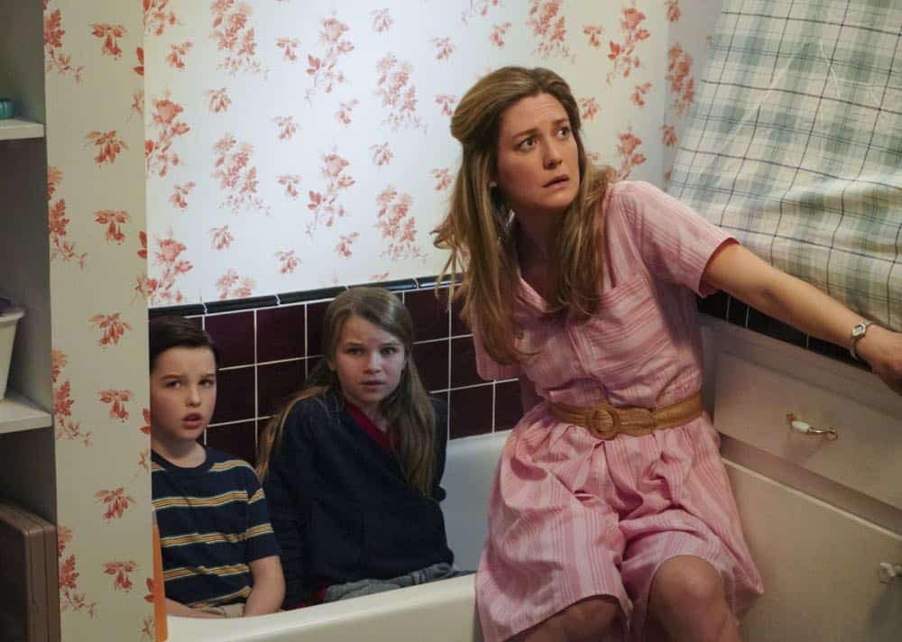 "A Mother, a Child, and a Blue Man's Backside" - Pictured: Sheldon (Iain Armitage), Missy (Raegan Revord) and Mary (Zoe Perry). Mary bans Sheldon from reading a mature comic book, and Sheldon decides it's time to stop living under Mary's thumb, on YOUNG SHELDON, Thursday, April 12 (8:31-9:01 PM, ET/PT) on the CBS Television Network. Photo: Bill Inoshita/CBS é2018 CBS Broadcasting, Inc. All Rights Reserved.