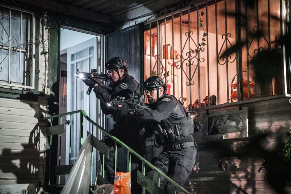 "Armory" -- As Hondo and SWAT work to de-escalate a hostage situation in which an ex-convict is holding a local family captive, the mission takes a dangerous turn that impacts the team. Also, when Street tires of his complicated romantic entanglements, he agrees to let Chris make over his online dating profile, on S.W.A.T., Thursday, April 12 (10:00-11:00 PM, ET/PT) on the CBS Television Network. Pictured L to R: Kenny Johnson as Dominique Luca and Shemar Moore as Daniel "Hondo" Harrelson.Photo: Bill Inoshita/CBS é2018 CBS Broadcasting, Inc. All Rights Reserved