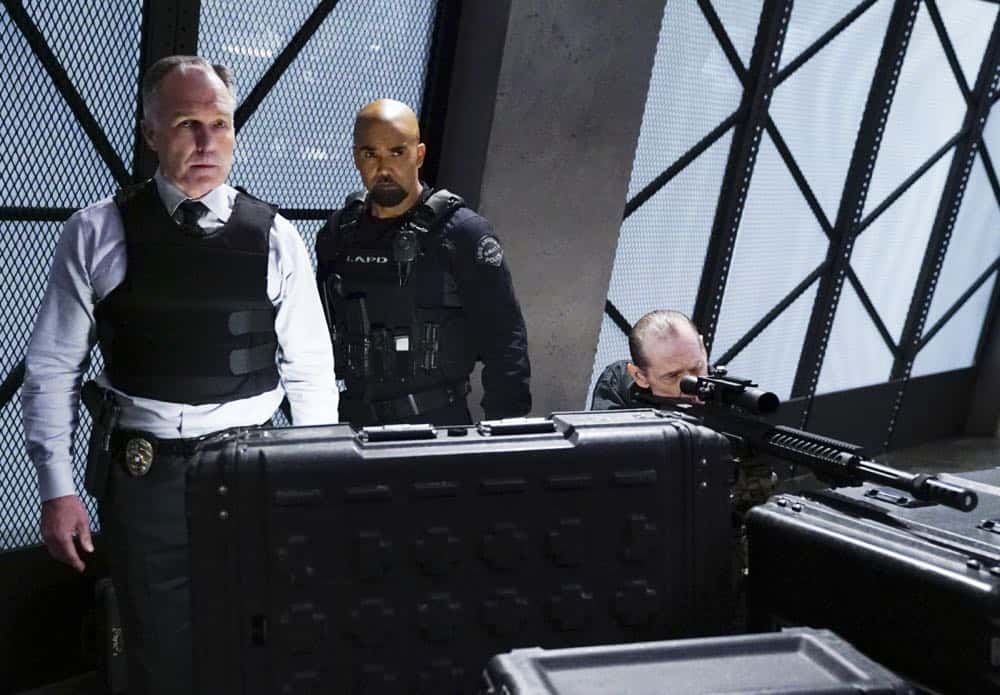 "Armory" -- As Hondo and SWAT work to de-escalate a hostage situation in which an ex-convict is holding a local family captive, the mission takes a dangerous turn that impacts the team. Also, when Street tires of his complicated romantic entanglements, he agrees to let Chris make over his online dating profile, on S.W.A.T., Thursday, April 12 (10:00-11:00 PM, ET/PT) on the CBS Television Network. Pictured L to R: Patrick St. Esprit as Robert Hicks and Shemar Moore as Daniel "Hondo" Harrelson. Photo: Sonja Flemming/CBS é2018 CBS Broadcasting, Inc. All Rights Reserved