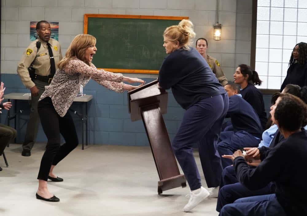 "Crazy Snakes and a Clog to the Head" -- When the ladies bring a meeting to a women's prison, Bonnie is attacked by an old acquaintance, Tammy (Kristen Johnston), and Christy helps Bonnie make amends, on MOM, Thursday, April 12 (9:01-9:30 PM, ET/PT) on the CBS Television Network. Pictured L to R: Allison Janney as Bonnie and Kristen Johnston as Tammy. Photo: Robert Voets/CBS é2018 CBS Broadcasting, Inc. All Rights Reserved