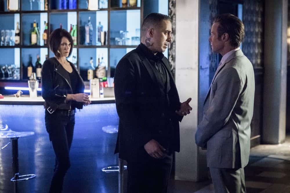 Arrow -- "The Dragon" -- Image Number: AR619a_0097.jpg -- Pictured (L-R): Katie Cassidy as Laurel/Black Siren, Kirk Acevedo as Ricardo Diaz and Ashton Holmes as Eric Cartier -- Photo: Dean Buscher/The CW -- é 2018 The CW Network, LLC. All rights reserved. Arrow -- "The Dragon" -- Image Number: AR619a_0097.jpg -- Pictured (L-R): Katie Cassidy as Laurel/Black Siren, Kirk Acevedo as Ricardo Diaz and Ashton Holmes as Eric Cartier -- Photo: Dean Buscher/The CW -- é 2018 The CW Network, LLC. All rights reserved.