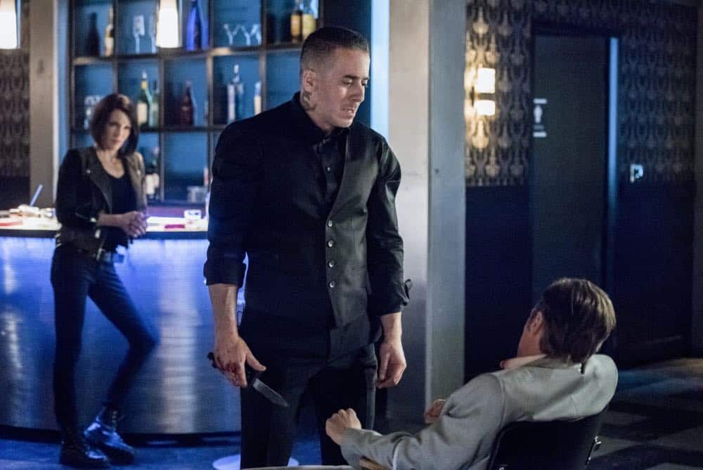 Arrow -- "The Dragon" -- Image Number: AR619a_0462.jpg -- Pictured (L-R): Katie Cassidy as Laurel/Black Siren, Kirk Acevedo as Ricardo Diaz and Ashton Holmes as Eric Cartier -- Photo: Dean Buscher/The CW -- é 2018 The CW Network, LLC. All rights reserved.