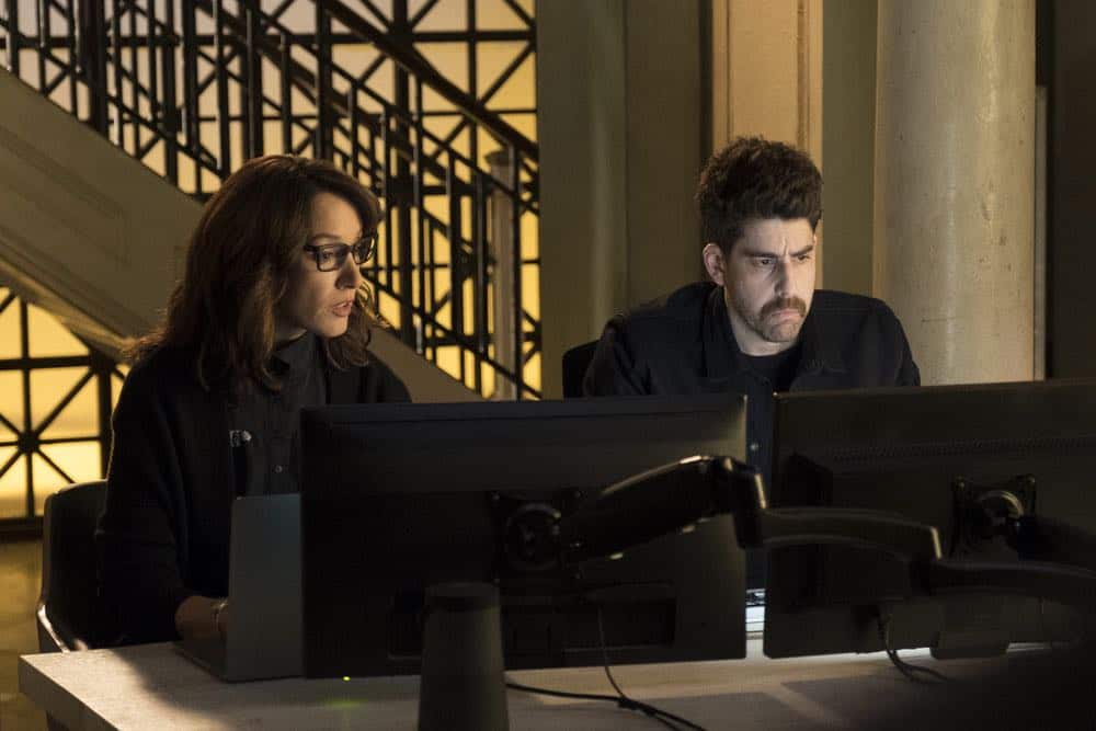 TAKEN -- "Imperium" Episode 212 -- Pictured: (l-r) Jennifer Beals as Christina Hart, Adam Goldberg as Kilroy -- (Photo by: Christos Kalohoridis/NBC)
