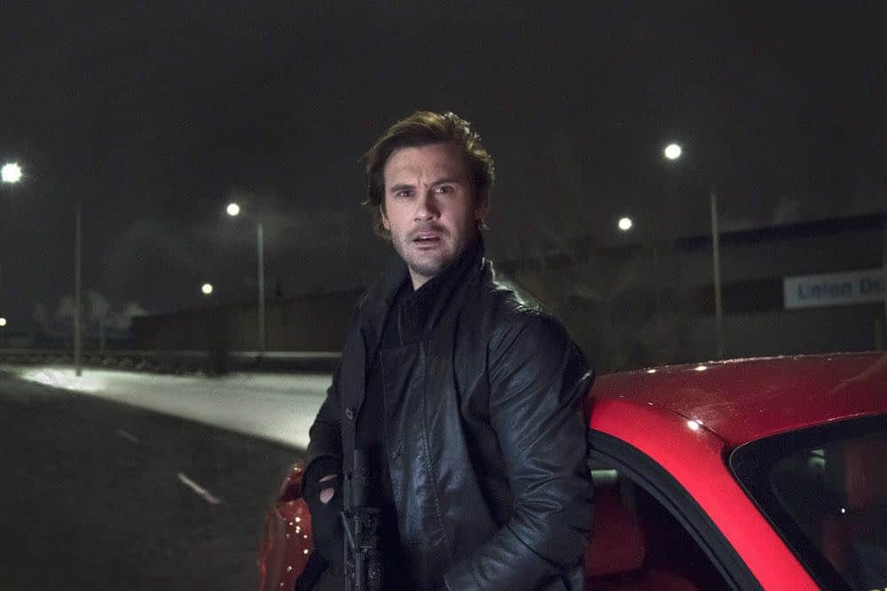 TAKEN -- "Imperium" Episode 212 -- Pictured: (l-r) Clive Standen as Bryan Mills, Ryan Blaney as Agent Wood -- (Photo by: Panagiotis Pantazidis/NBC)