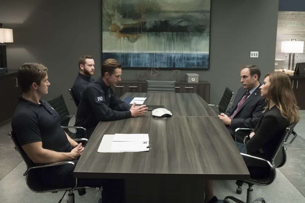 iZombie -- "Don't Hate the Player, Hate the Brain" -- Image Number: ZMB407a_0240b.jpg -- Pictured (L-R): Robert Buckley as Major, Jason Dohring as Chase Graves, Kurt Evans as D.A Baracus, and Aly Michalka as Peyton -- Photo Credit: Katie Yu/The CW -- é 2018 The CW Network, LLC. All Rights Reserved