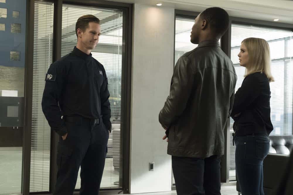 iZombie -- "Don't Hate the Player, Hate the Brain" -- Image Number: ZMB407a_0308b.jpg -- Pictured (L-R): Jason Dohring as Chase Graves, Malcolm Goodwin as Clive, and Rose McIver as Liv-- Photo Credit: Katie Yu/The CW -- é 2018 The CW Network, LLC. All Rights Reserved