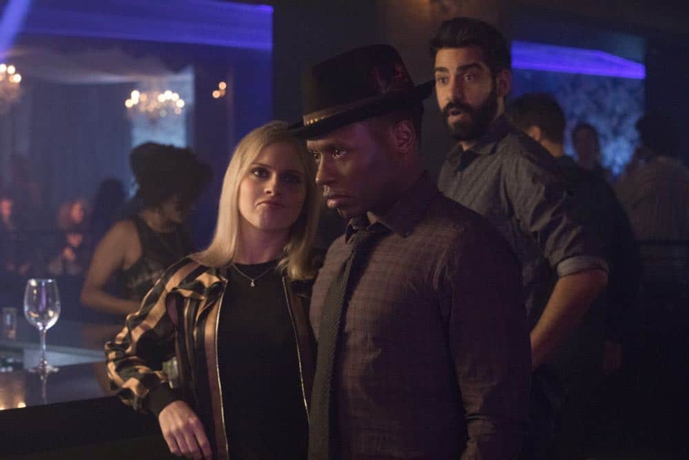 iZombie -- "Don't Hate the Player, Hate the Brain" -- Image Number: ZMB407b_0195b.jpg -- Pictured (L-R): Rose McIver as Liv, Malcolm Goodwin as Clive, and Rahul Kohli as Ravi -- Photo Credit: Jack Rowand/The CW -- é 2018 The CW Network, LLC. All Rights Reserved