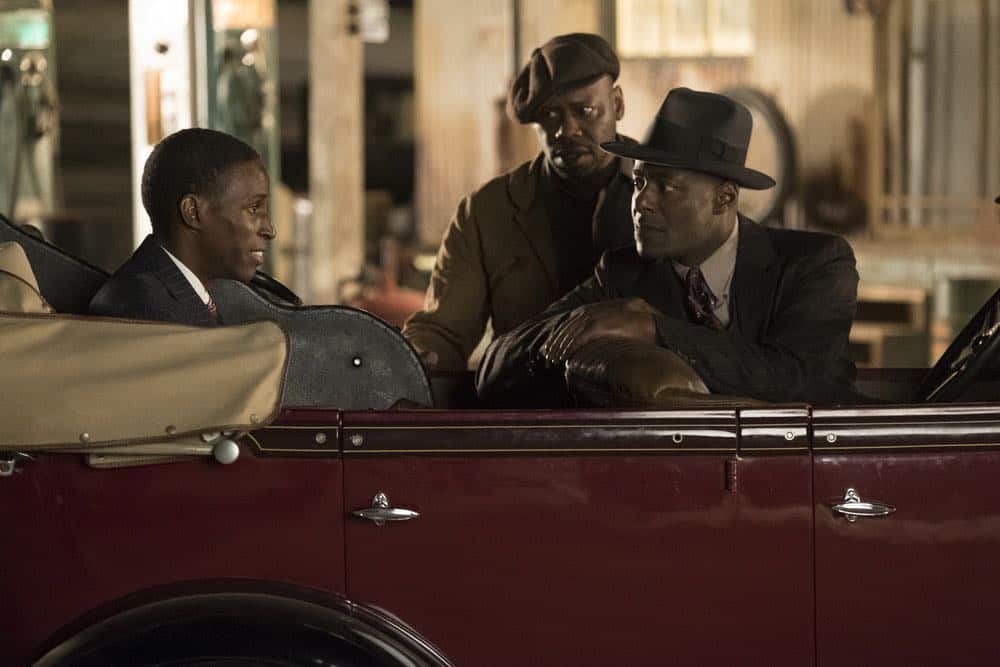 TIMELESS -- "King of Delta Blues" Episode 206 -- Pictured: (l-r) Malcolm Barrett as Rufus Carlin, Kamal Naiqui as Robert Johnson, Paterson Joseph as Connor Mason -- (Photo by: Justin Lubin/NBC)