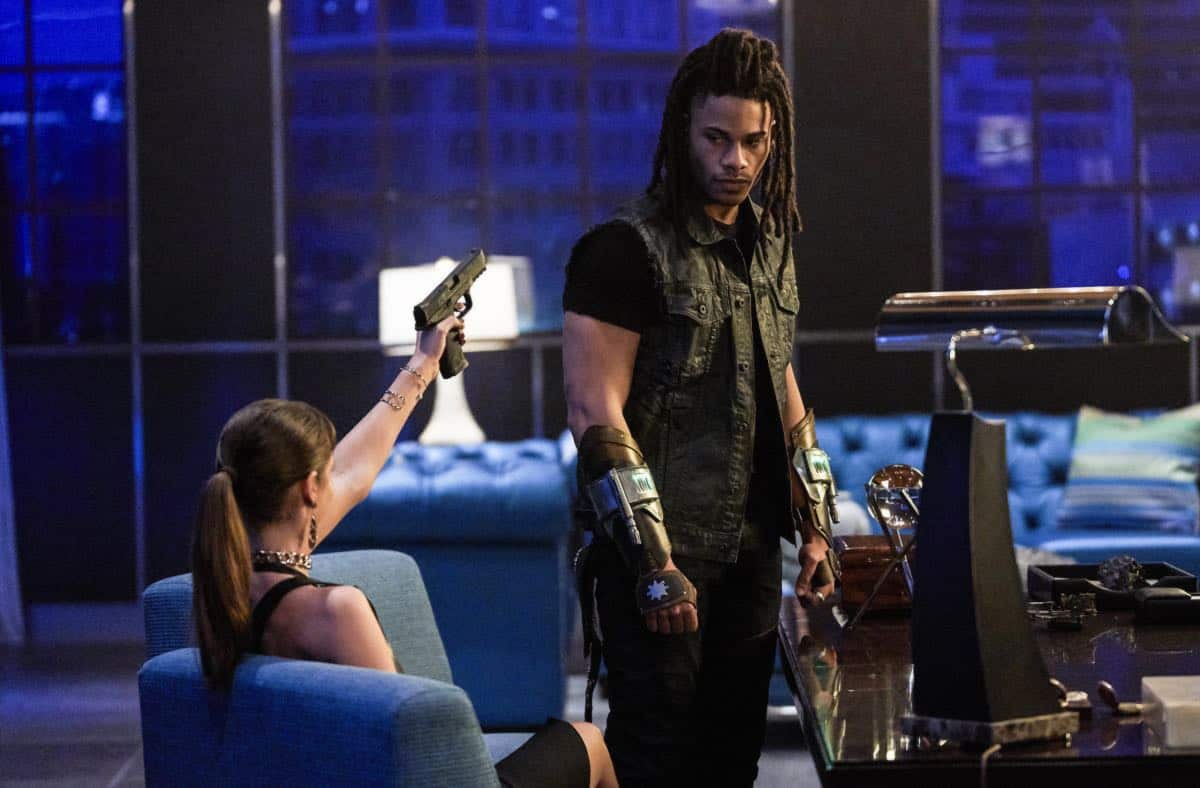 Black Lightning -- " Shadow of Death: The Book of War" -- Image BLK113c_0125b.jpg -- Pictured (L-R): Charlbi Dean Kriek as Syonide and Jordan Calloway as Khalil/Painkillerà-- Photo: Bob Mahoney/The CW -- é 2018 The CW Network, LLC. All rights reserved