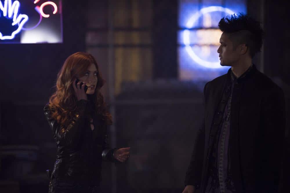 SHADOWHUNTERS - "A Window Into an Empty Room" - Clary teams up with Magnus to investigate a recent demon attack. Simon is stunned with he’s visited by someone he never thought he’d see again, and who now won’t seem to leave. Meanwhile, Izzy worries about dinner with her family and a special guest and Luke reaches out to Maryse. This episode of "Shadowhunters" airs Tuesday, April 24 (8:00 - 9:00 p.m. EDT) on Freeform. (Freeform/John Medland) KATHERINE MCNAMARA, HARRY SHUM JR.