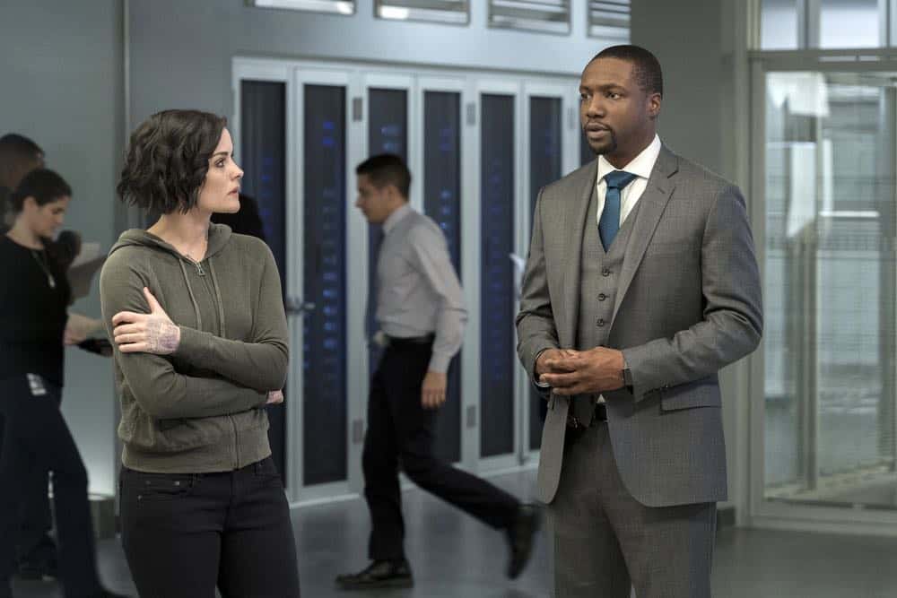 BLINDSPOT -- "Clamorous Night" Episode 318 -- Pictured: (l-r) Jaimie Alexander as Jane Doe, Rob Brown as Edgar Reade -- (Photo by: David Giesbrecht/NBC/Warner Bros) BLINDSPOT -- "Clamorous Night" Episode 318 -- Pictured: (l-r) Jaimie Alexander as Jane Doe, Rob Brown as Edgar Reade -- (Photo by: David Giesbrecht/NBC/Warner Bros)