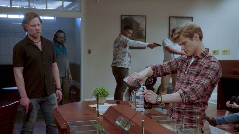 "Wind + Water" -- While MacGyver is in Puerto Rico helping his friend rebuild his hurricane-damaged home, he is taken hostage in the bank his friend manages when robbers attempt to steal $2 million, on MACGYVER, Friday, April 20 (8:00-9:00 PM, ET/PT) on the CBS Television Network. Pictured: Marc Manchaca, Lucas Till Photo: CBS é2018 CBS Broadcasting, Inc. All Rights Reserved