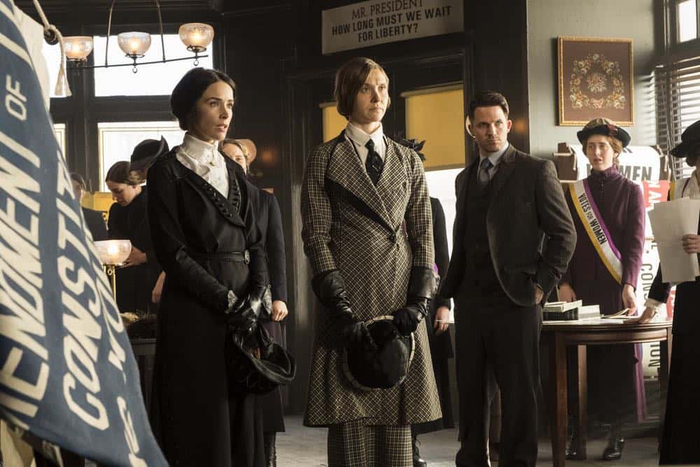 TIMELESS -- "Mrs. Sherlock Holmes" Episode 207 -- Pictured: (l-r) Abigail Spencer as Lucy Preston, Sarah Sokolovic as Grace Humiston, Matt Lanter as Wyatt Logan -- (Photo by: Justin Lubin/NBC)
