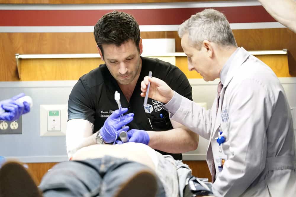 CHICAGO MED -- "The Parent Trap" Episode 317 -- Pictured: (l-r) Colin Donnell as Connor Rhodes, Eddie Jemison as Dr. Stohl -- (Photo by: Elizabeth Sisson/NBC)