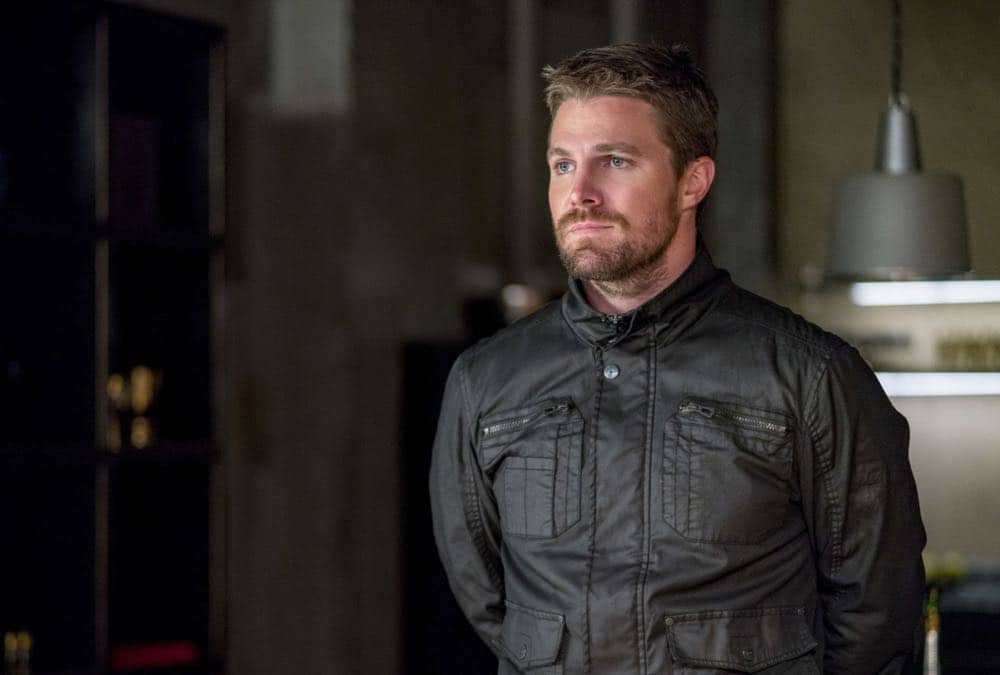 Arrow -- "Shifting Allegiances" -- Image Number: AR620b_0195.jpg -- Pictured: Stephen Amell as Oliver Queen/Green Arrow -- Photo: Daniel Power/The CW -- é 2018 The CW Network, LLC. All Rights Reserved.