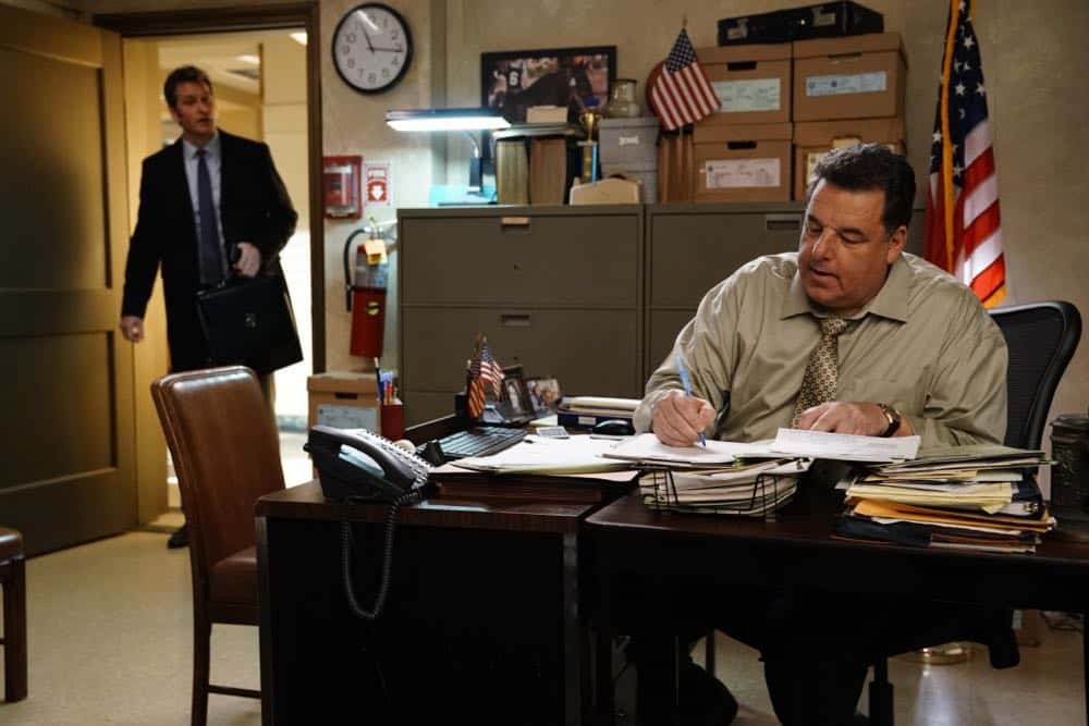 "Your Six" -- When Danny resorts to asking his incarcerated archenemy, Victor Lugo (Nick Cordero), for help locating a dangerous criminal who escaped from prison, Lugo refuses to assist unless he's allowed to accompany them on the pursuit. Also, Frank subtly tries to convince Jamie to take the sergeant's test, and Erin's plan to go on a date with her ex-husband causes friction between her and Anthony, on BLUE BLOODS, Friday, April 27 (10:00-11:00 PM, ET/PT) on the CBS Television Network. Pictured: Peter Hermann, Steven Schirripa Photo: John Paul Filo/CBS é2018CBS Broadcasting Inc. All Rights Reserved.