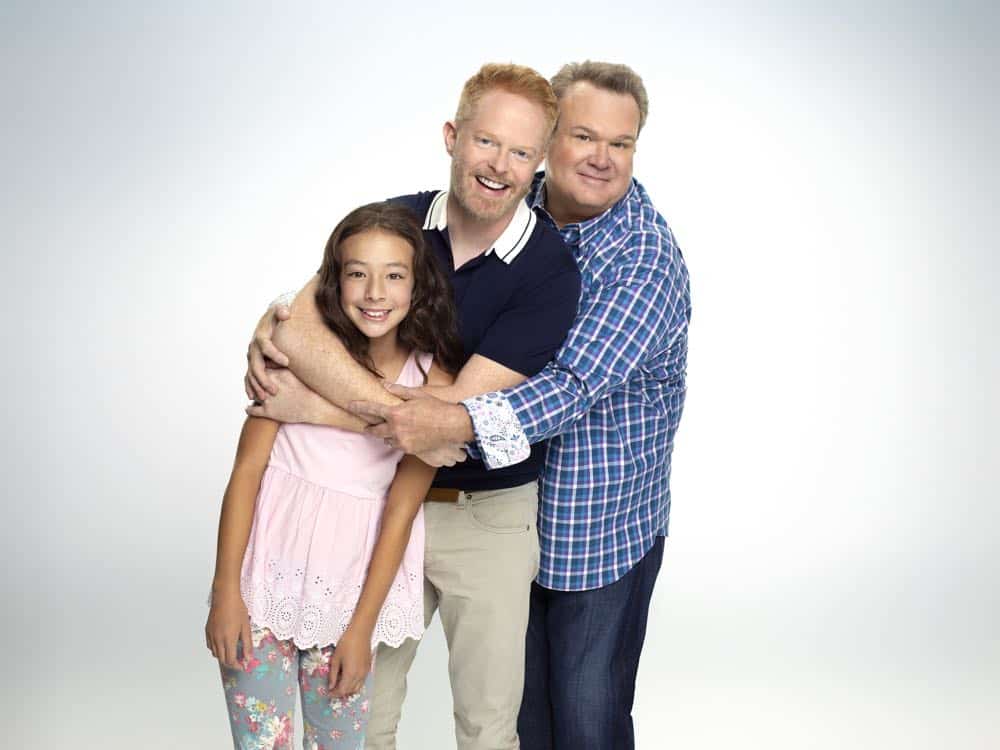 MODERN FAMILY - ABC's "Modern Family" stars Aubrey Anderson-Emmons as Lily Tucker-Pritchett, Jesse Tyler Ferguson as Mitchell Pritchett, and Eric Stonestreet as Cameron Tucker. (ABC/Robert Ashcroft)