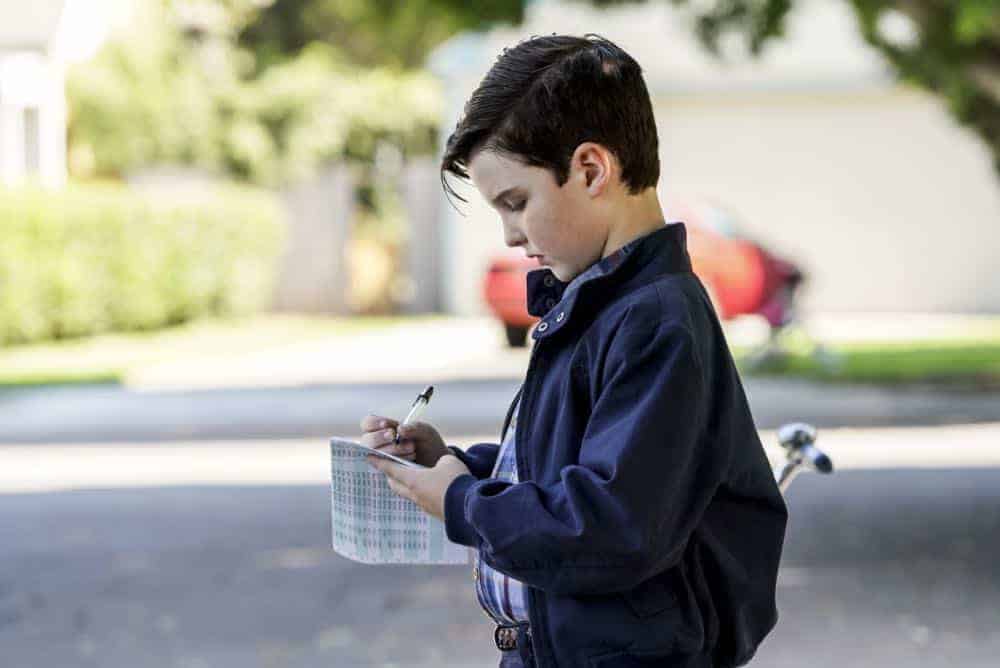 "A High-Pitched Buzz and Training Wheels" - Pictured: Sheldon (Iain Armitage). After Sheldon dismantles the refrigerator to stop an annoying hum, he gets a paper route to pay for the repairs, on the second season premiere of YOUNG SHELDON, on a special night, Monday, Sept. 24 (8:31-9:01 PM, ET/PT) on the CBS Television Network. Photo: Bill Inoshita/CBS é2018 CBS Broadcasting, Inc. All Rights Reserved.