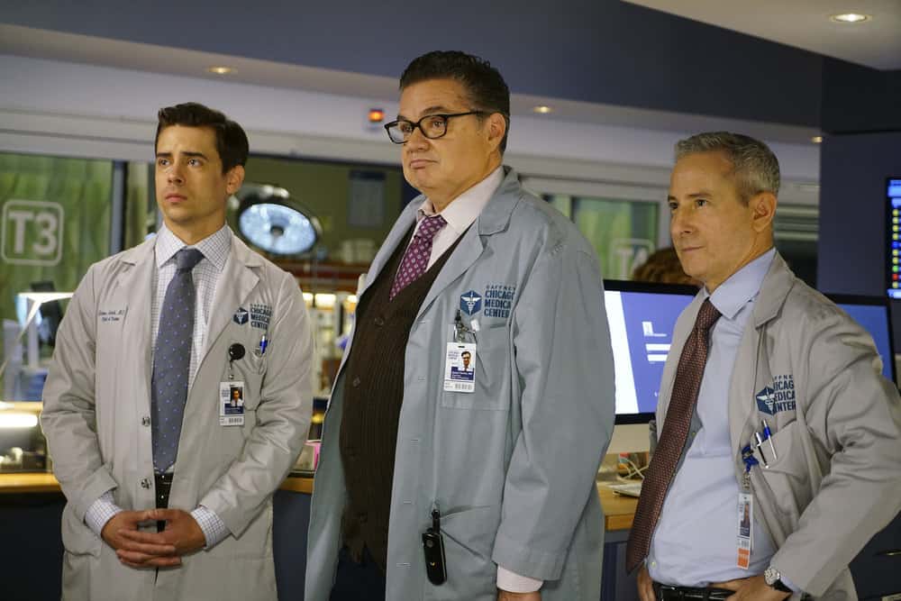 CHICAGO MED -- "Be My Better Half" Episode 401 -- Pictured: (l-r) Nate Santana as Jimmy Lanik, Oliver Platt as Dr. Daniel Charles, Eddie Jemison as Dr. Stanley Stohl -- (Photo by: Elizabeth Sisson/NBC)