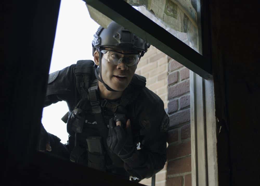 "Shaky Town" -- The SWAT team engages in a standoff with human traffickers holding child hostages when a major earthquake hits Los Angeles during their operation and compromises the takedown. Also, while Hondo forms an unexpected personal connection with Deputy District Attorney Nia Wells (Nikiva Dionne), Jim Street has trouble adjusting to his new life as a patrol officer, on the second season premiere of S.W.A.T., Thursday, Sept. 27 (10:00-11:00 PM, ET/PT) on the CBS Television Network. Pictured: David Lim as Victor Tan. Photo: Screengrab/CBS é2018 CBS Broadcasting, Inc. All Rights Reserved "Shaky Town" -- The SWAT team engages in a standoff with human traffickers holding child hostages when a major earthquake hits Los Angeles during their operation and compromises the takedown. Also, while Hondo forms an unexpected personal connection with Deputy District Attorney Nia Wells (Nikiva Dionne), Jim Street has trouble adjusting to his new life as a patrol officer, on the second season premiere of S.W.A.T., Thursday, Sept. 27 (10:00-11:00 PM, ET/PT) on the CBS Television Network. Pictured: David Lim as Victor Tan. Photo: Screengrab/CBS é2018 CBS Broadcasting, Inc. All Rights Reserved