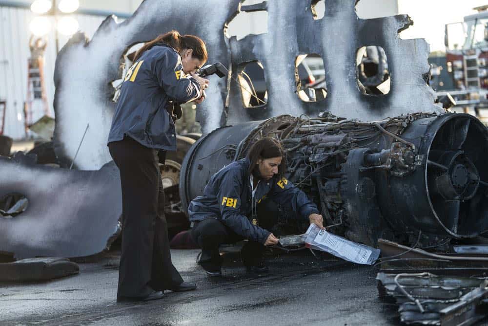 MANIFEST -- "Reentry" Episode 102 -- Pictured: (l-r) FBI Agents Surveying Scene -- (Photo by: Peter Kramer/NBC)