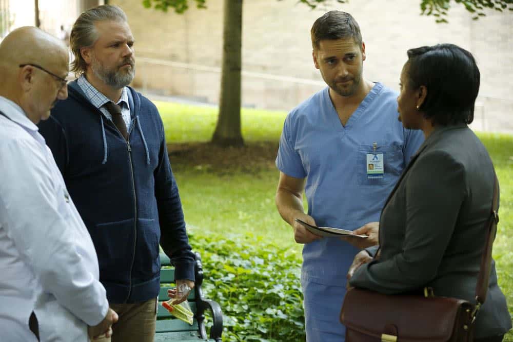 NEW AMSTERDAM -- "Rituals" Episode 102 -- Pictured: (l-r) Anupam Kher as Dr. Vijay Kapoor, Tyler Labine as Dr. Iggy Frome, Ryan Eggold as Dr. Max Goodwin -- (Photo by: Will Hart/NBC) NEW AMSTERDAM -- "Rituals" Episode 102 -- Pictured: (l-r) Anupam Kher as Dr. Vijay Kapoor, Tyler Labine as Dr. Iggy Frome, Ryan Eggold as Dr. Max Goodwin -- (Photo by: Will Hart/NBC)