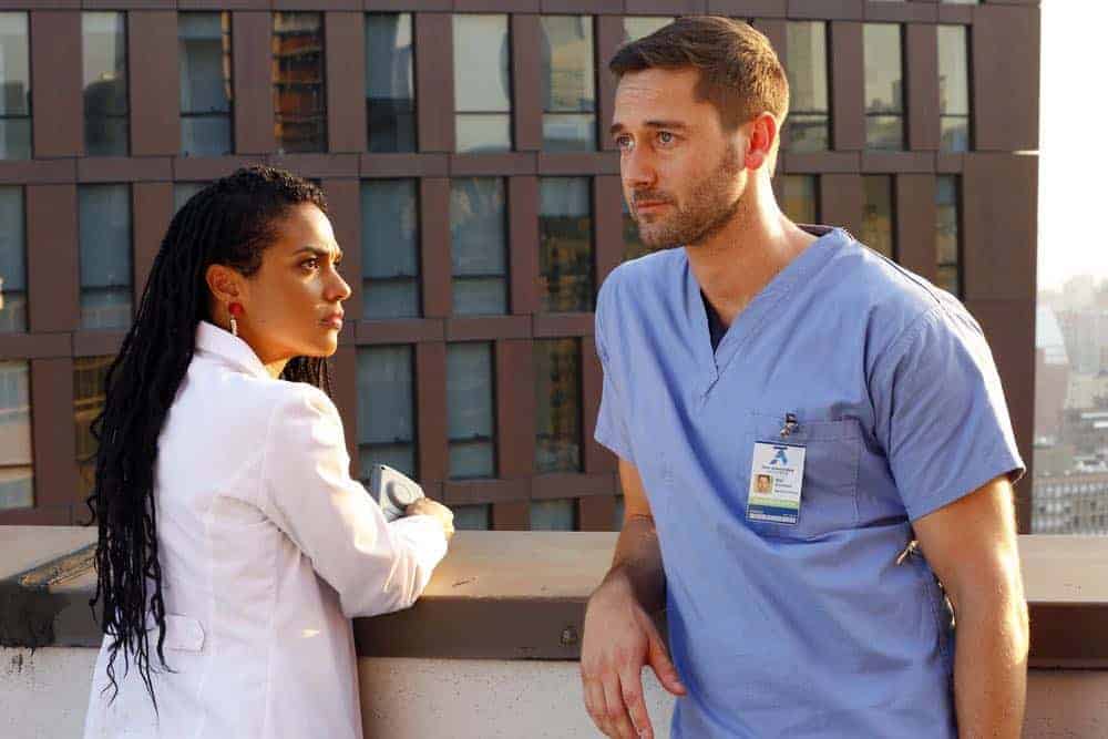 NEW AMSTERDAM -- "Rituals" Episode 102 -- Pictured: (l-r) Freema Agyeman as Dr. Helen Sharpe, Ryan Eggold as Dr. Max Goodwin -- (Photo by: Will Hart/NBC)