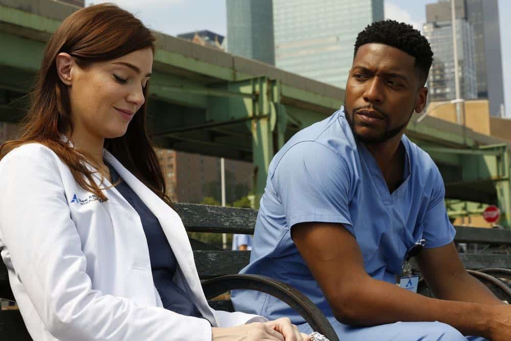 NEW AMSTERDAM -- "Rituals" Episode 102 -- Pictured: (l-r) Janet Montgomery as Dr. Lauren Bloom, Jocko Sims as Dr. Floyd Reynolds -- (Photo by: Will Hart/NBC)