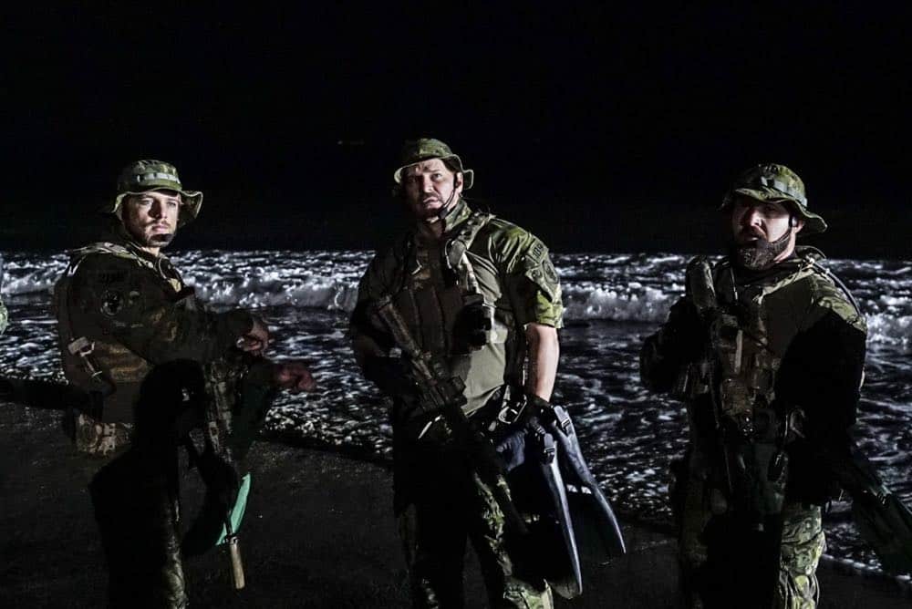 "Fracture" -- Jason and Bravo Team head to the Gulf of Guinea to rescue American hostages after an oil platform is overtaken by armed militants, on the second season premiere of SEAL TEAM, Wednesday, Oct. 3 (9:00-10:00 PM, ET/PT) on the CBS Television Network. Pictured L to R: Max Thieriot as Clay Spenser, David Boreanaz as Jason Hayes and AJ Buckley as Sonny Quinn. Photo: Monty Brinton/CBS é2018 CBS Broadcasting, Inc. All Rights Reserved