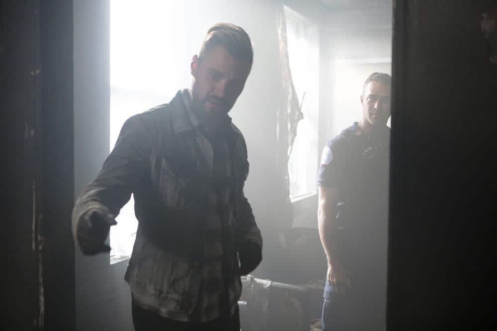 CHICAGO P.D. -- "Endings" Episode 603 -- Pictured: (l-r) Patrick John Flueger as Adam Ruzek, Taylor Kinney as Kelly Severide -- (Photo by: Adrian Burrows/NBC)