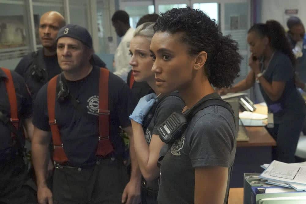 CHICAGO FIRE -- "Going to War" Episode 702 -- Pictured: (l-r) Joe Minoso as Joe Cruz, Tony Ferraris as Tony, Kara Killmer as Sylvie Brett, Annie Ilonzeh as Emily Foster -- (Photo by: Elizabeth Morris/NBC)
