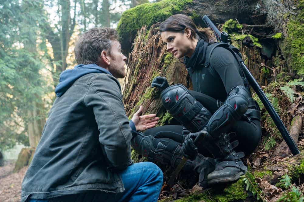 VAN HELSING -- "Fresh Tendrils" Episode 301 -- Pictured: (l-r) Jonathan Scarfe as Axel Miller, Missy Peregrym as Scarlett Harker -- (Photo by: Dan Power/Nomadic Pictures Inc./SYFY) VAN HELSING -- "Fresh Tendrils" Episode 301 -- Pictured: (l-r) Jonathan Scarfe as Axel Miller, Missy Peregrym as Scarlett Harker -- (Photo by: Dan Power/Nomadic Pictures Inc./SYFY)