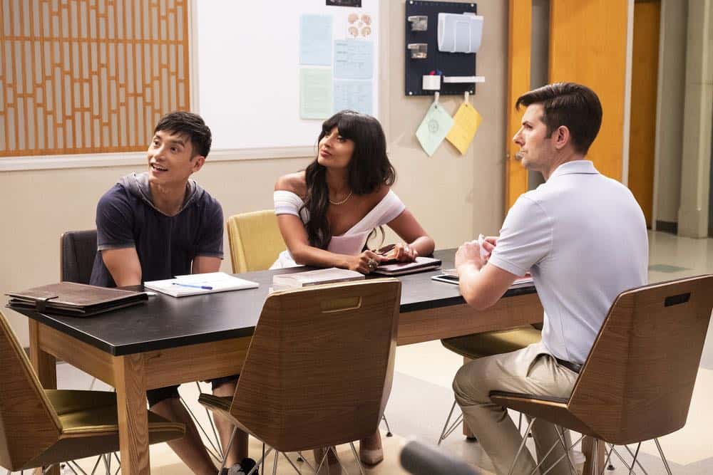 THE GOOD PLACE -- "The Brainy Bunch" Episode 303 -- Pictured: (l-r) Manny Jacinto as Jason Mendoza, Jameela Jamil as Tahani, Adam Scott as Trevor -- (Photo by: Justin Lubin/NBC)