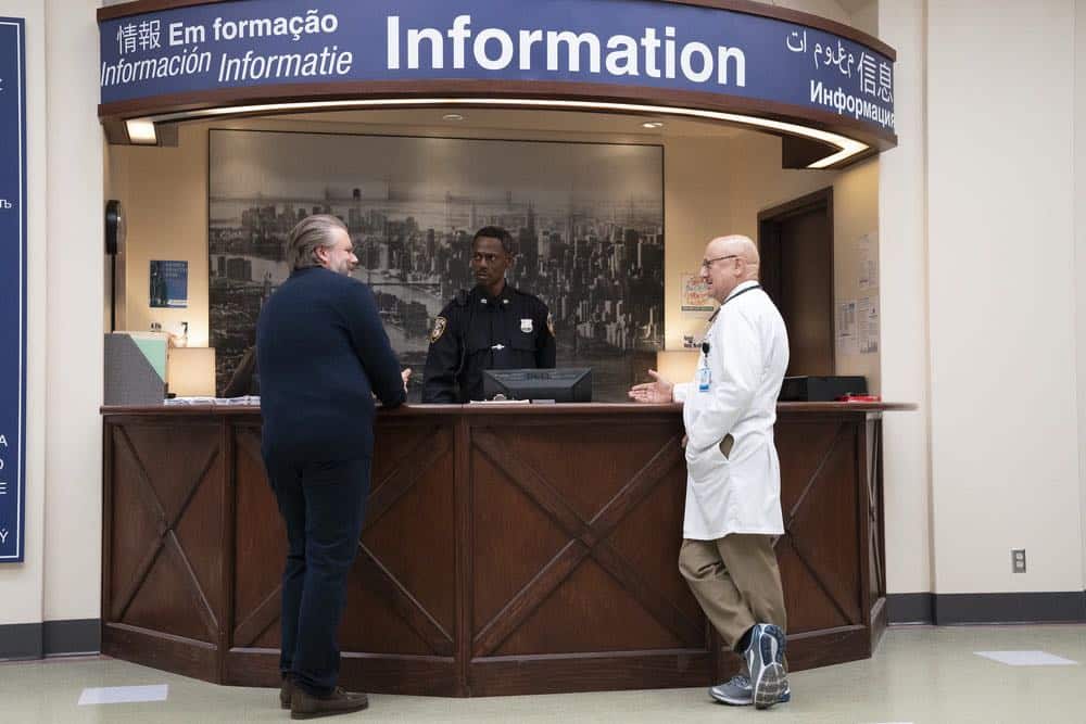 NEW AMSTERDAM -- "Every Last Minute" Episode 103 -- Pictured: (l-r) Tyler Labine as Dr. Iggy Frome, Anupam Kher as Dr. Vijay Kapoor -- (Photo by: Virginia Sherwood/NBC) NEW AMSTERDAM -- "Every Last Minute" Episode 103 -- Pictured: (l-r) Tyler Labine as Dr. Iggy Frome, Anupam Kher as Dr. Vijay Kapoor -- (Photo by: Virginia Sherwood/NBC)