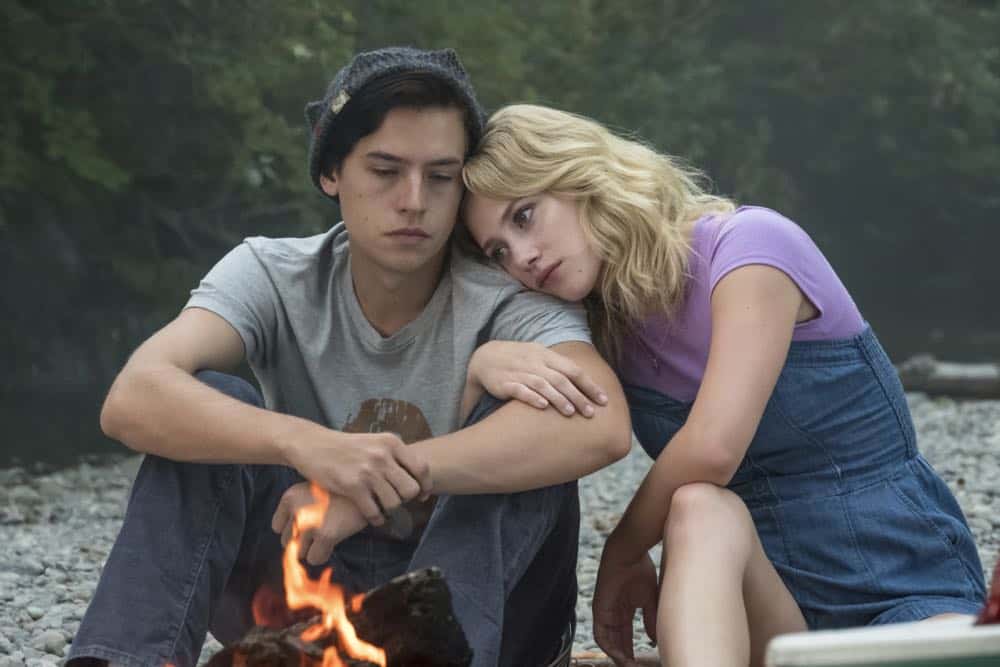 Riverdale -- "Chapter Thirty-Six: Labor Day" -- Image Number: RVD301a_0268.jpg -- Pictured (L-R): Cole Sprouse as Jughead and Lili Reinhart as Betty -- Photo: Katie Yu/The CW -- é 2018 The CW Network, LLC. All Rights Reserved. Riverdale -- "Chapter Thirty-Six: Labor Day" -- Image Number: RVD301a_0268.jpg -- Pictured (L-R): Cole Sprouse as Jughead and Lili Reinhart as Betty -- Photo: Katie Yu/The CW -- é 2018 The CW Network, LLC. All Rights Reserved.