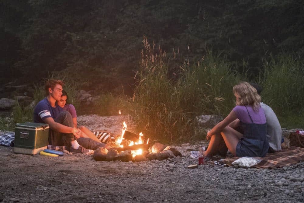 Riverdale -- "Chapter Thirty-Six: Labor Day" -- Image Number: RVD301a_0317.jpg -- Pictured (L-R): KJ Apa as Archie, Camila Mendes as Veronica, Cole Sprouse as Jughead and Lili Reinhart as Betty -- Photo: Katie Yu/The CW -- é 2018 The CW Network, LLC. All Rights Reserved. Riverdale -- "Chapter Thirty-Six: Labor Day" -- Image Number: RVD301a_0317.jpg -- Pictured (L-R): KJ Apa as Archie, Camila Mendes as Veronica, Cole Sprouse as Jughead and Lili Reinhart as Betty -- Photo: Katie Yu/The CW -- é 2018 The CW Network, LLC. All Rights Reserved.