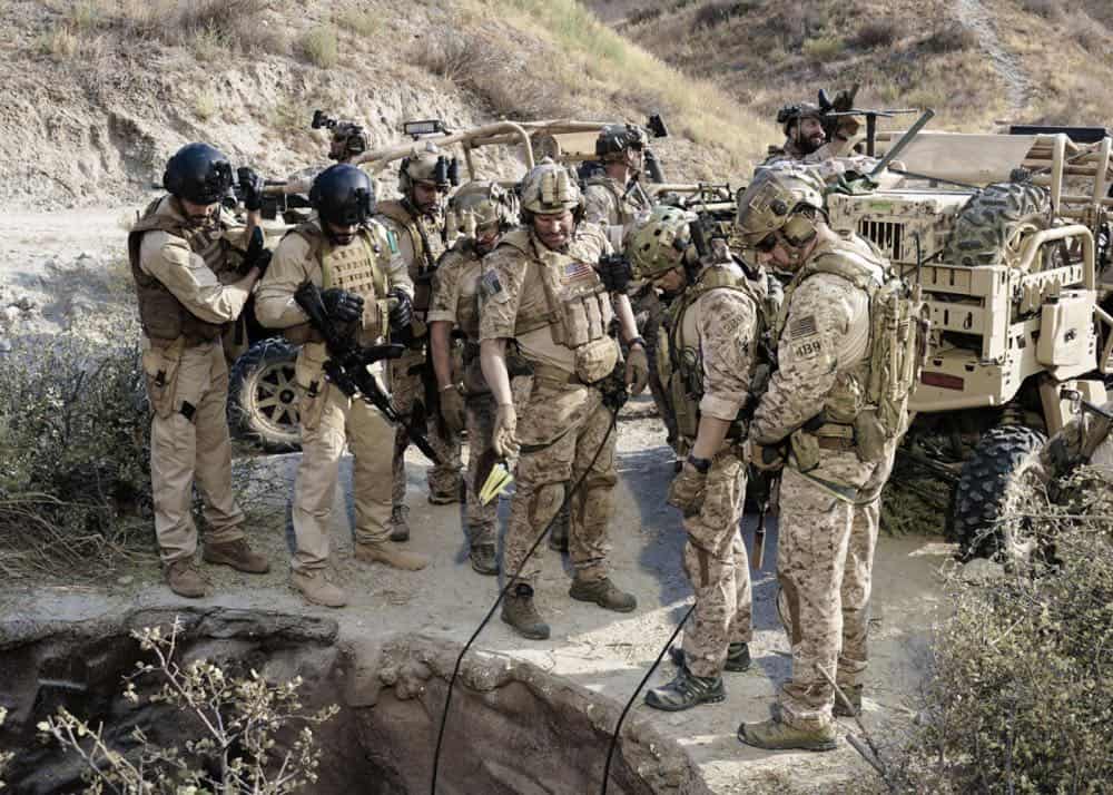 "Never Say Die" -- Jason and Bravo Team travel to Saudi Arabia, where extremists take hold of an underground water source and threaten to release anthrax into the water supply. Also, Ray contemplates joining another team, on SEAL TEAM, Wednesday, Oct. 10 (9:00-10:00 PM, ET/PT) on the CBS Television Network. Pictured: AJ Buckley as Sonny Quinn, David Boreanaz as Jason Hayes, Max Thieriot as Clay Spenser, and Tyler Grey as Trent. Photo: Monty Brinton/CBS é2018 CBS Broadcasting, Inc. All Rights Reserved