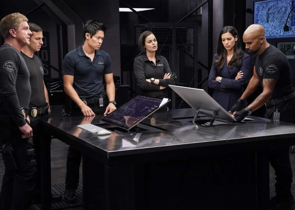 "Fire and Smoke" -- The SWAT team is enlisted by Hondo's new romantic interest, Deputy District Attorney Nia Wells (Nikiva Dionne), to protect the jurors of a high-profile bribery trial, after some of them are targeted by organized crime in a series of fire-bombings, on S.W.A.T., Thursday, Oct. 11 (10:00-11:00 PM, ET/PT) on the CBS Television Network. Pictured L to R: Kenny Johnson as Dominique Luca, Juan Javier Cardenas as Beni, David Lim as Victor Tan, Lina Esco as Christina "Chris" Alonso, Stephanie Sigman as Jessica Cortez, and Shemar Moore as Daniel "Hondo" Harrelson. Photo: Robert Voets/CBS é2018 CBS Broadcasting, Inc. All Rights Reserved "Fire and Smoke" -- The SWAT team is enlisted by Hondo's new romantic interest, Deputy District Attorney Nia Wells (Nikiva Dionne), to protect the jurors of a high-profile bribery trial, after some of them are targeted by organized crime in a series of fire-bombings, on S.W.A.T., Thursday, Oct. 11 (10:00-11:00 PM, ET/PT) on the CBS Television Network. Pictured L to R: Kenny Johnson as Dominique Luca, Juan Javier Cardenas as Beni, David Lim as Victor Tan, Lina Esco as Christina "Chris" Alonso, Stephanie Sigman as Jessica Cortez, and Shemar Moore as Daniel "Hondo" Harrelson. Photo: Robert Voets/CBS é2018 CBS Broadcasting, Inc. All Rights Reserved