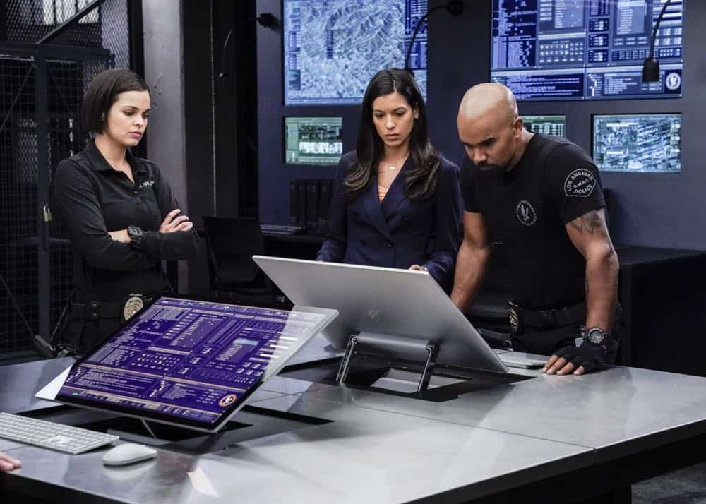 "Fire and Smoke" -- The SWAT team is enlisted by Hondo's new romantic interest, Deputy District Attorney Nia Wells (Nikiva Dionne), to protect the jurors of a high-profile bribery trial, after some of them are targeted by organized crime in a series of fire-bombings, on S.W.A.T., Thursday, Oct. 11 (10:00-11:00 PM, ET/PT) on the CBS Television Network. Pictured L to R: Lina Esco as Christina "Chris" Alonso, Stephanie Sigman as Jessica Cortez, and Shemar Moore as Daniel "Hondo" Harrelson. Photo: Robert Voets/CBS é2018 CBS Broadcasting, Inc. All Rights Reserved "Fire and Smoke" -- The SWAT team is enlisted by Hondo's new romantic interest, Deputy District Attorney Nia Wells (Nikiva Dionne), to protect the jurors of a high-profile bribery trial, after some of them are targeted by organized crime in a series of fire-bombings, on S.W.A.T., Thursday, Oct. 11 (10:00-11:00 PM, ET/PT) on the CBS Television Network. Pictured L to R: Lina Esco as Christina "Chris" Alonso, Stephanie Sigman as Jessica Cortez, and Shemar Moore as Daniel "Hondo" Harrelson. Photo: Robert Voets/CBS é2018 CBS Broadcasting, Inc. All Rights Reserved