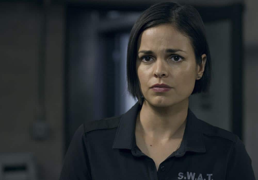 "Fire and Smoke" -- The SWAT team is enlisted by Hondo's new romantic interest, Deputy District Attorney Nia Wells (Nikiva Dionne), to protect the jurors of a high-profile bribery trial, after some of them are targeted by organized crime in a series of fire-bombings, on S.W.A.T., Thursday, Oct. 11 (10:00-11:00 PM, ET/PT) on the CBS Television Network. Pictured: Lina Esco as Christina "Chris" Alonso. Photo: Screengrab/CBS é2018 CBS Broadcasting, Inc. All Rights Reserved "Fire and Smoke" -- The SWAT team is enlisted by Hondo's new romantic interest, Deputy District Attorney Nia Wells (Nikiva Dionne), to protect the jurors of a high-profile bribery trial, after some of them are targeted by organized crime in a series of fire-bombings, on S.W.A.T., Thursday, Oct. 11 (10:00-11:00 PM, ET/PT) on the CBS Television Network. Pictured: Lina Esco as Christina "Chris" Alonso. Photo: Screengrab/CBS é2018 CBS Broadcasting, Inc. All Rights Reserved