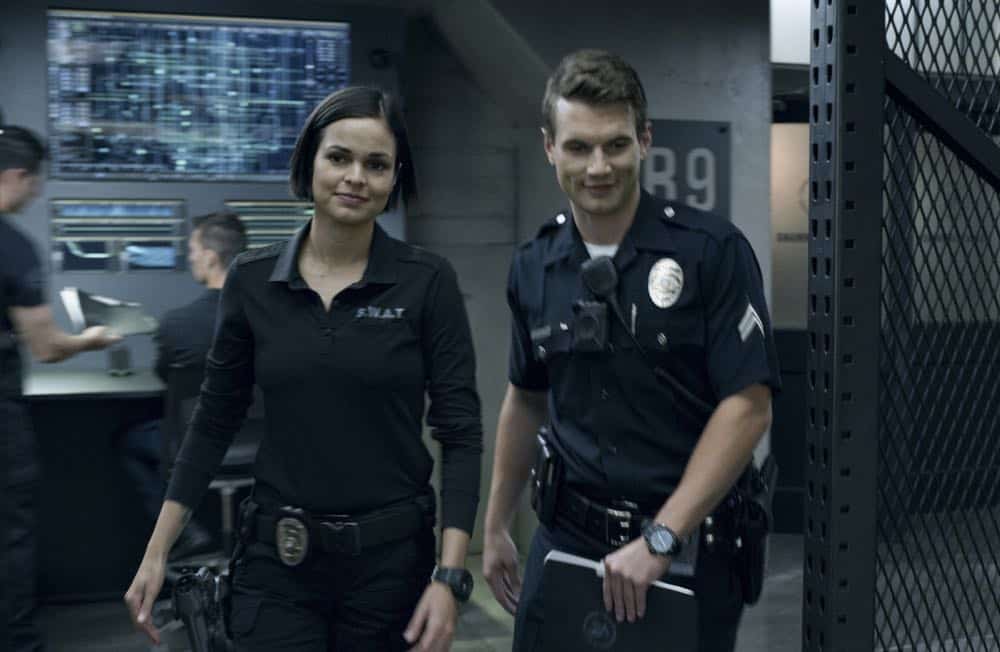"Fire and Smoke" -- The SWAT team is enlisted by Hondo's new romantic interest, Deputy District Attorney Nia Wells (Nikiva Dionne), to protect the jurors of a high-profile bribery trial, after some of them are targeted by organized crime in a series of fire-bombings, on S.W.A.T., Thursday, Oct. 11 (10:00-11:00 PM, ET/PT) on the CBS Television Network. Pictured L to R: Lina Esco as Christina "Chris" Alonso and Alex Russell as Jim Street. Photo: Screengrab/CBS é2018 CBS Broadcasting, Inc. All Rights Reserved