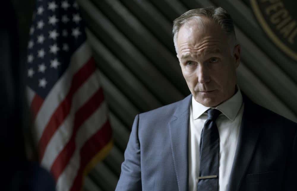 "Fire and Smoke" -- The SWAT team is enlisted by Hondo's new romantic interest, Deputy District Attorney Nia Wells (Nikiva Dionne), to protect the jurors of a high-profile bribery trial, after some of them are targeted by organized crime in a series of fire-bombings, on S.W.A.T., Thursday, Oct. 11 (10:00-11:00 PM, ET/PT) on the CBS Television Network. Pictured: Patrick St. Esprit as Commander Robert Hicks. Photo: Screengrab/CBS é2018 CBS Broadcasting, Inc. All Rights Reserved