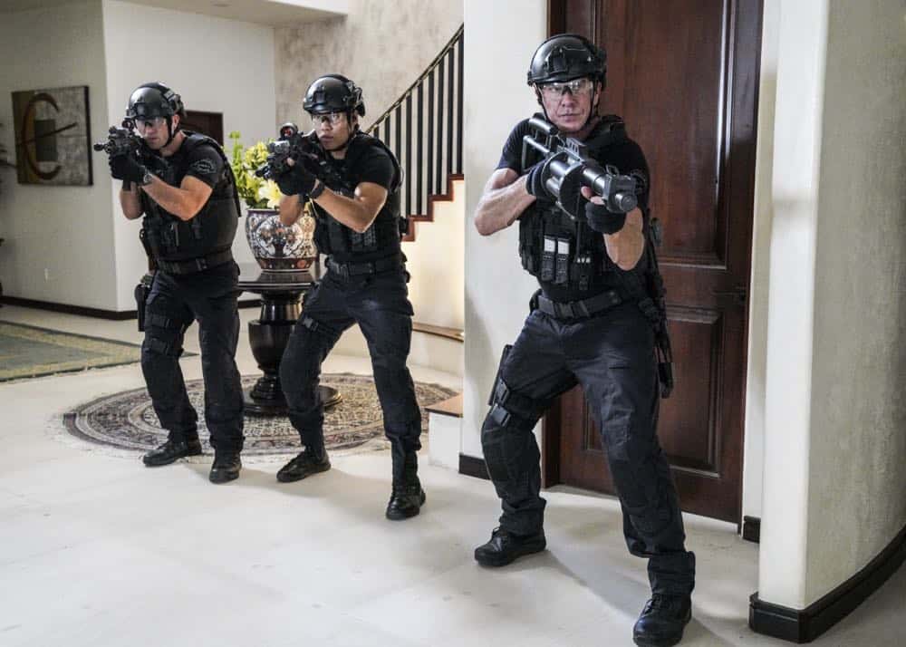 "Fire and Smoke" -- The SWAT team is enlisted by Hondo's new romantic interest, Deputy District Attorney Nia Wells (Nikiva Dionne), to protect the jurors of a high-profile bribery trial, after some of them are targeted by organized crime in a series of fire-bombings, on S.W.A.T., Thursday, Oct. 11 (10:00-11:00 PM, ET/PT) on the CBS Television Network. Pictured L to R: Juan Javier Cardenas as Beni, David Lim as Victor Tan and Kenny Johnson as Dominique Luca. Photo: Bill Inoshita/CBS é2018 CBS Broadcasting, Inc. All Rights Reserved