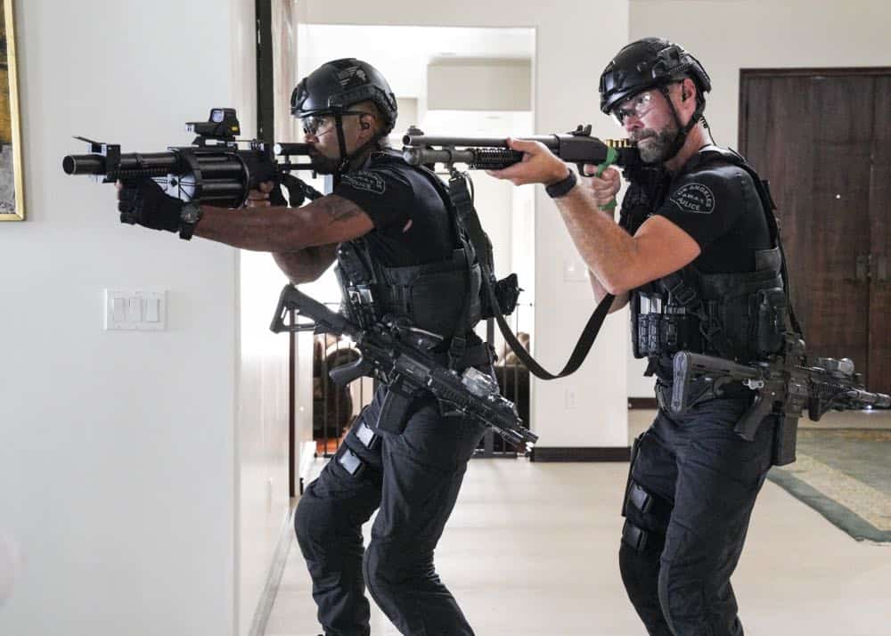 "Fire and Smoke" -- The SWAT team is enlisted by Hondo's new romantic interest, Deputy District Attorney Nia Wells (Nikiva Dionne), to protect the jurors of a high-profile bribery trial, after some of them are targeted by organized crime in a series of fire-bombings, on S.W.A.T., Thursday, Oct. 11 (10:00-11:00 PM, ET/PT) on the CBS Television Network. Pictured L to R: Shemar Moore as Daniel "Hondo" Harrelson and Jay Harrington as David "Deacon" Kay. Photo: Bill Inoshita/CBS é2018 CBS Broadcasting, Inc. All Rights Reserved