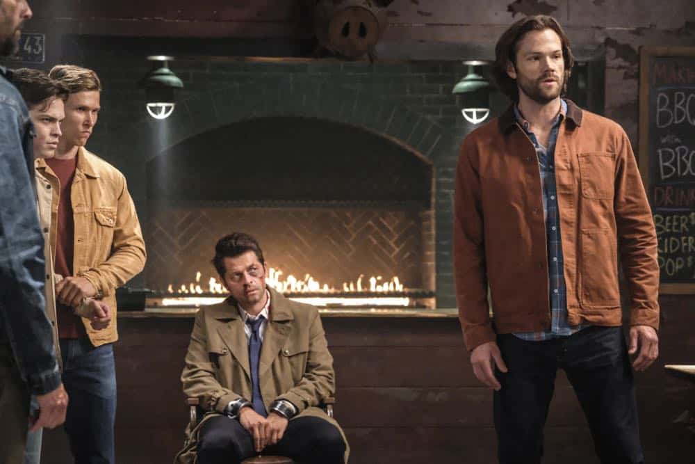 Supernatural -- "Stranger in a Strange Land" -- Image Number: SN1401b_0111b.jpg -- Pictured (L-R): Alexander Calvert as Jack, Misha Collins as Castiel and Jared Padalecki as Sam -- Photo: Bettina Strauss/The CW -- é 2018 The CW Network, LLC All Rights Reserved