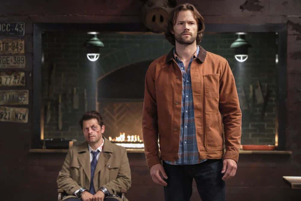 Supernatural -- "Stranger in a Strange Land" -- Image Number: SN1401b_0175b.jpg -- Pictured (L-R): Misha Collins as Castiel and Jared Padalecki as Sam -- Photo: Bettina Strauss/The CW -- é 2018 The CW Network, LLC All Rights Reserved